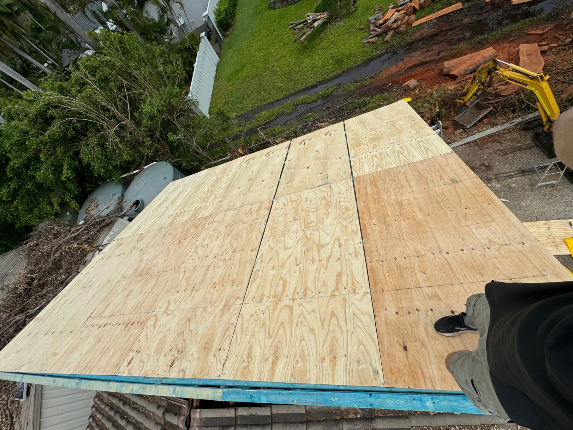 Ply roof deck sheeted and fixed over new framing with the excavator working below