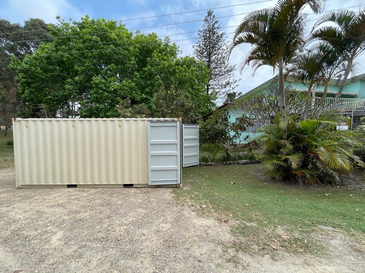 Shipping container placed on a residential property for secure on-site storage
